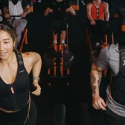 Orangetheory members wearing Omorpho weighted vests.