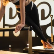woman on a Pilates reformer