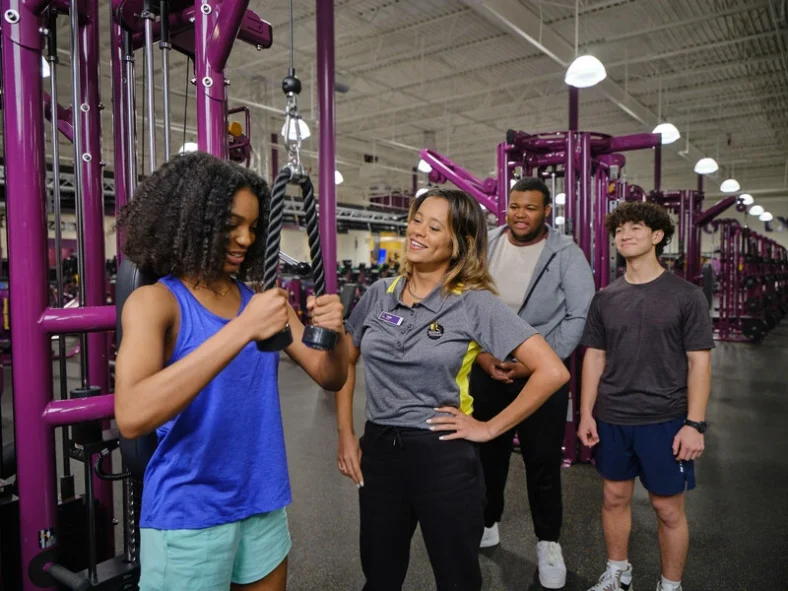 A group of teens at Planet Fitness.