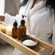 Woman inside a spa, holding tray
