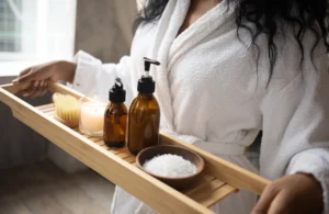 Woman inside a spa, holding tray