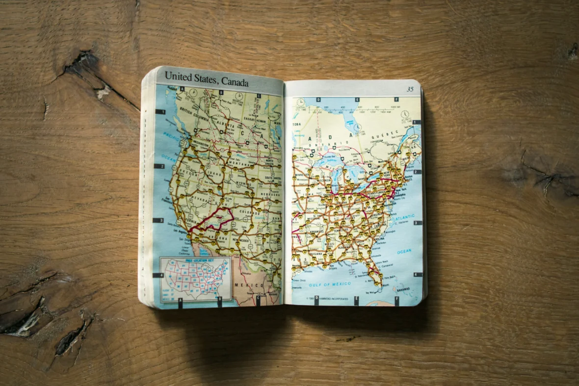 A book with a map of America inside.