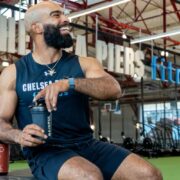 Man at Chelsea Piers fitness drinking Gainful products