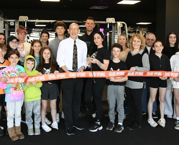 A ribbon cutting ceremony for Pump Room.