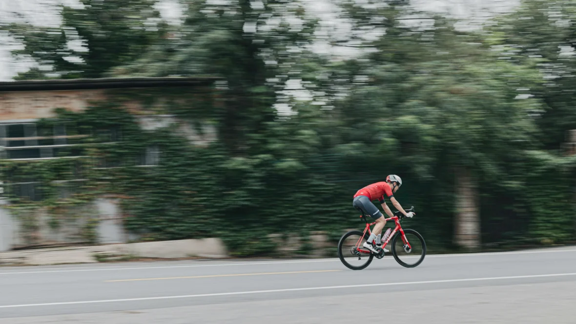 A cyclist at a high speed.