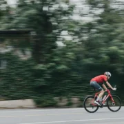 A cyclist at a high speed.