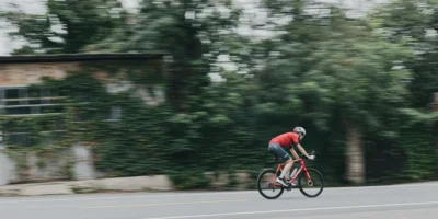 A cyclist at a high speed.