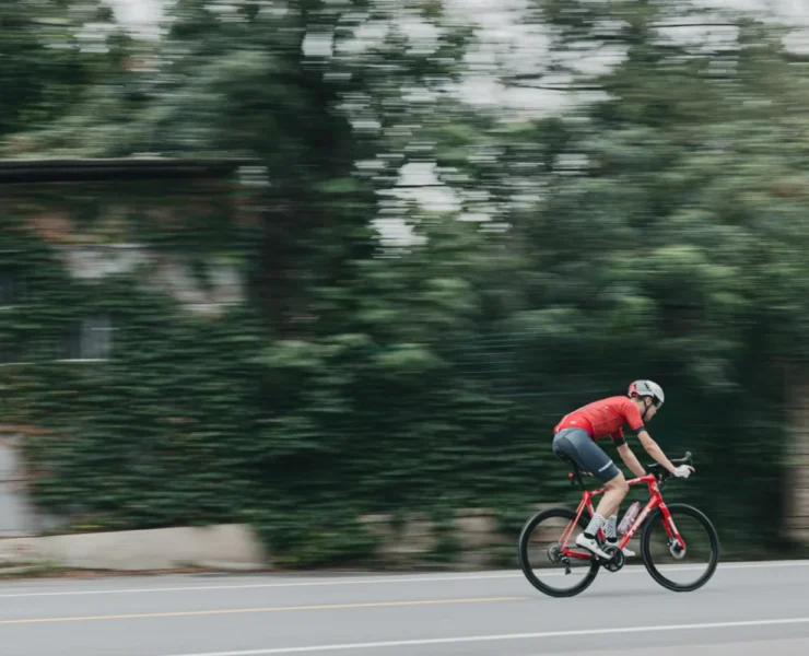A cyclist at a high speed.