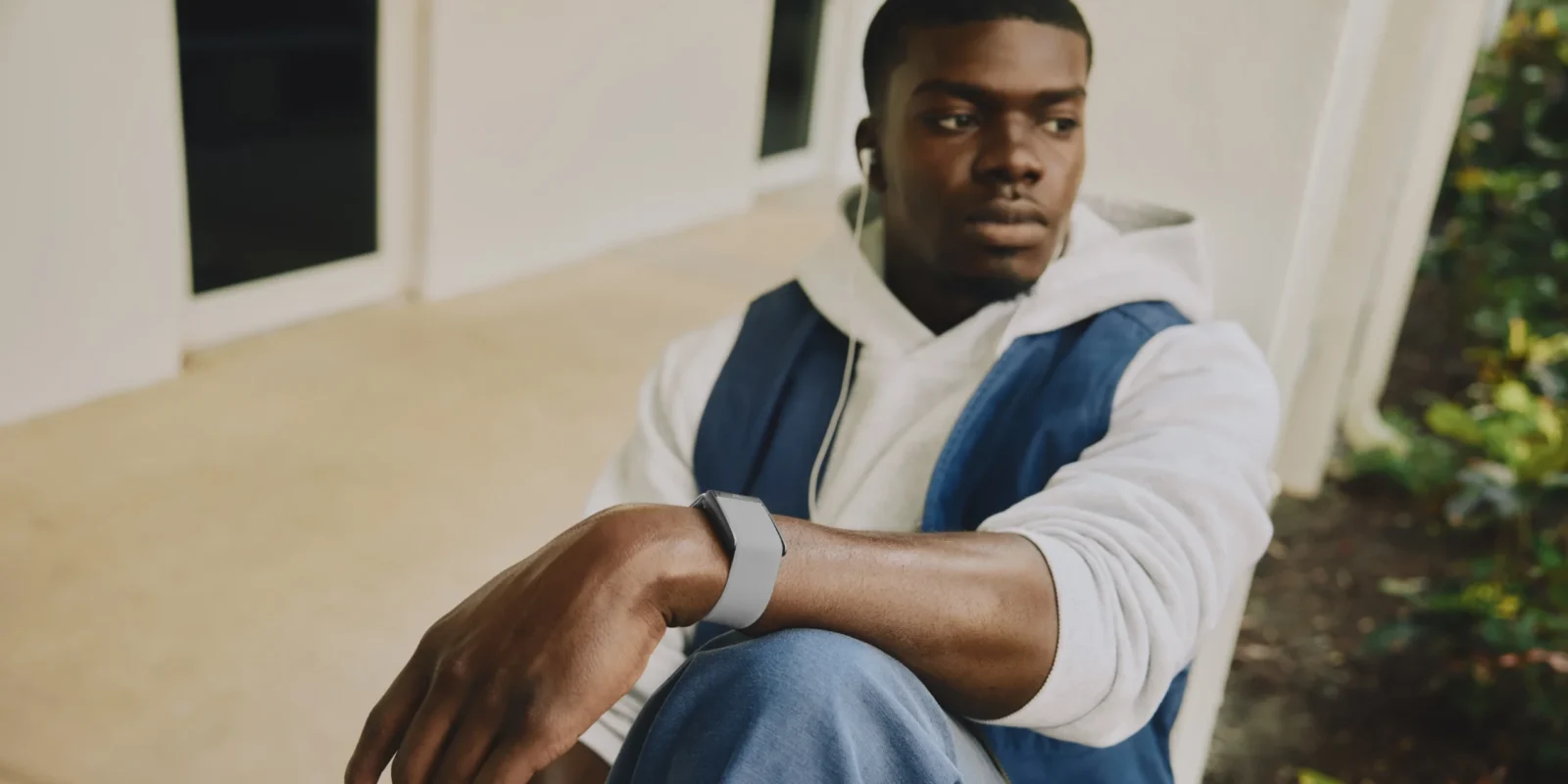 man wearing whoop device on wrist