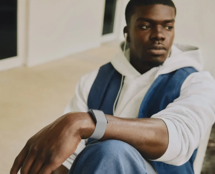 man wearing whoop device on wrist