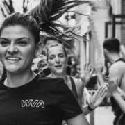 A small group training outdoors, running in NYC.