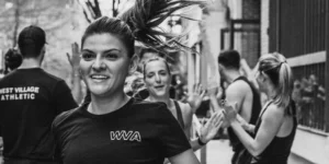 A small group training outdoors, running in NYC.