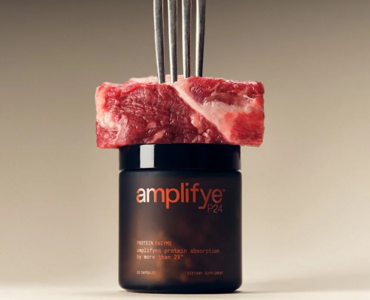 piece of steak on top of an amplifyeP24 supplement case