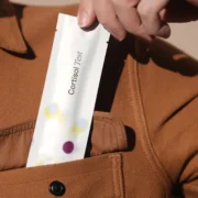 A man with a packaged swap in his jacket pocket.