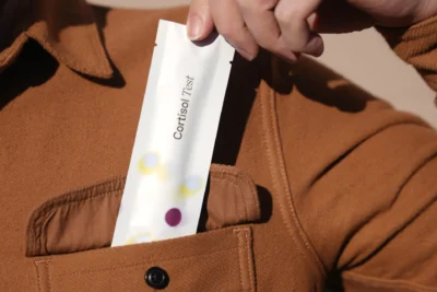 A man with a packaged swap in his jacket pocket.