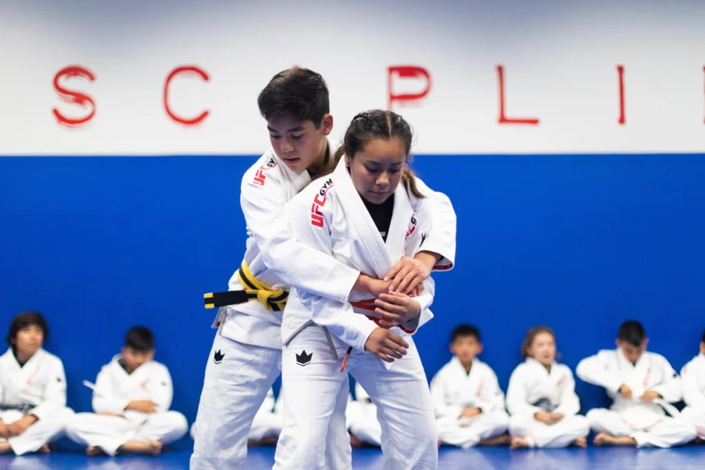 Kids training in martial arts.