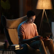 A man sitting in his living room.