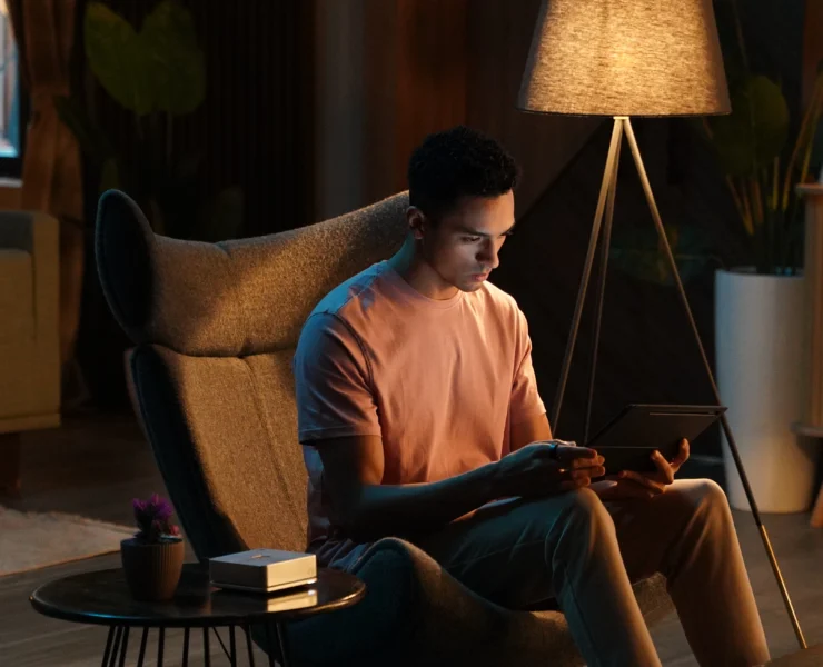 A man sitting in his living room.
