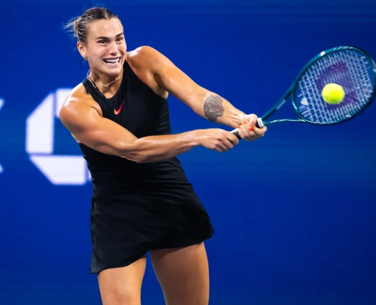 Aryna Sabalenka hits a tennis ball