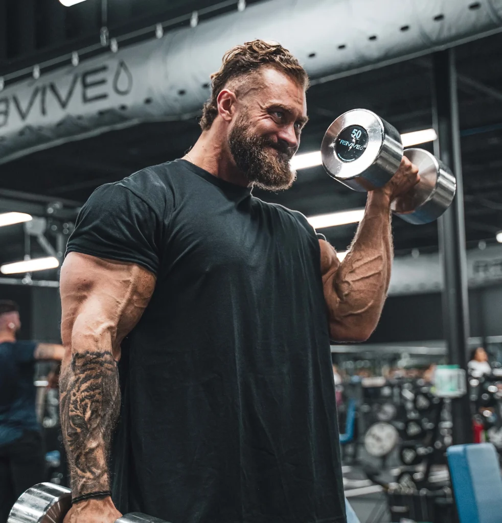 Chris Bumstead, a six-time Mr. Olympia, lifts weights