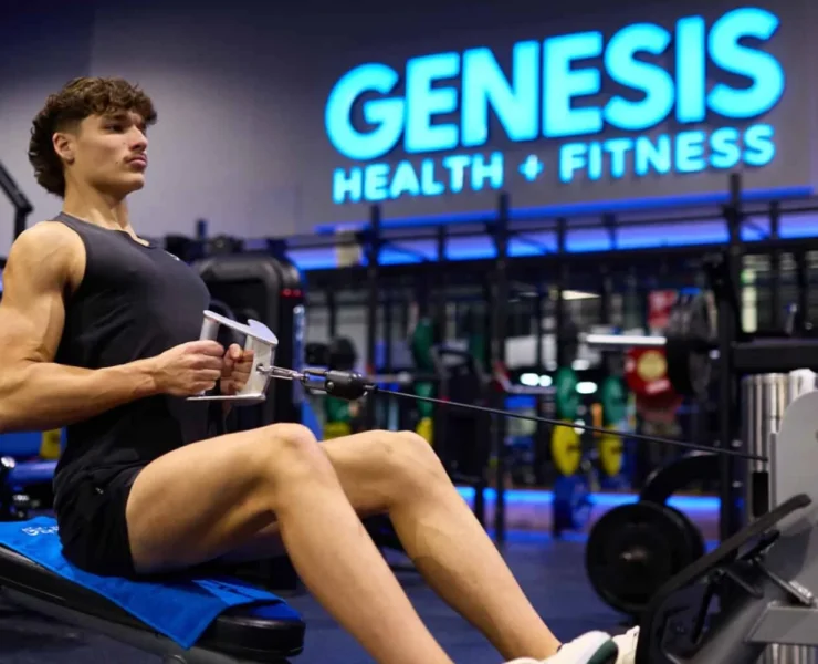 A man working out at Genesis Health + Fitness.