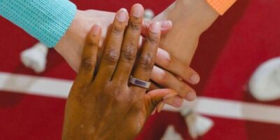 Several hands together for RingConn Gen 2 Smart Ring.