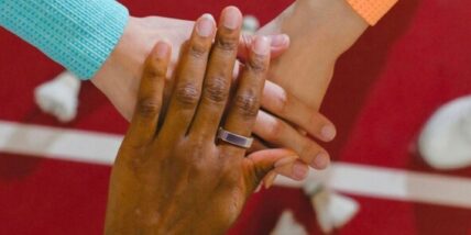 Several hands together for RingConn Gen 2 Smart Ring.