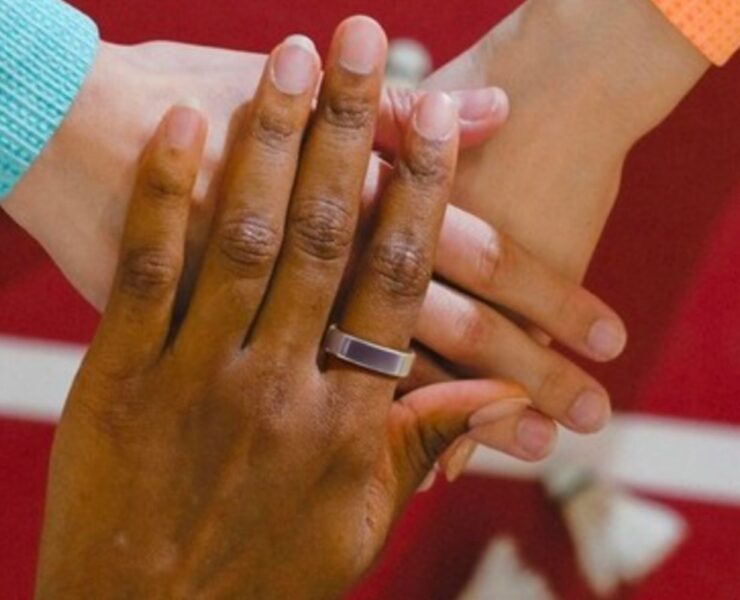 Several hands together for RingConn Gen 2 Smart Ring.