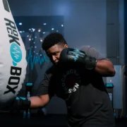 Man hitting a heavy bag