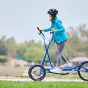 A woman using a device from Strider Fitness.