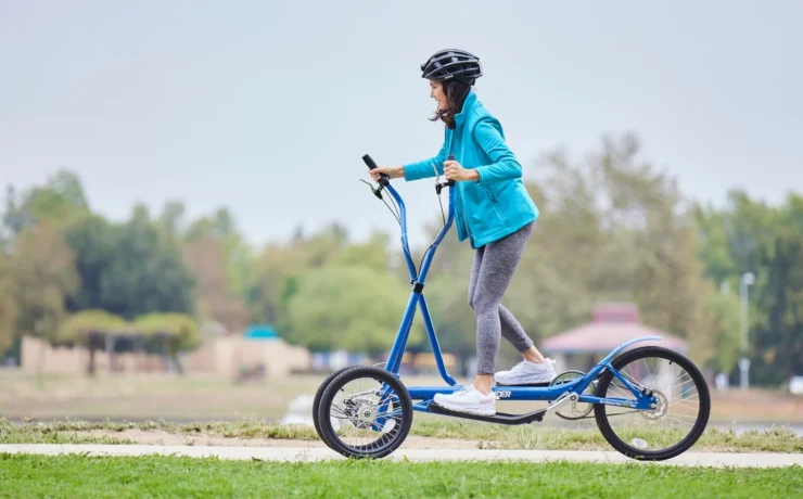 A woman using a device from Strider Fitness.