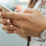 A woman looking at her phone.