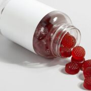 gummy vitamins spilling out of bottle