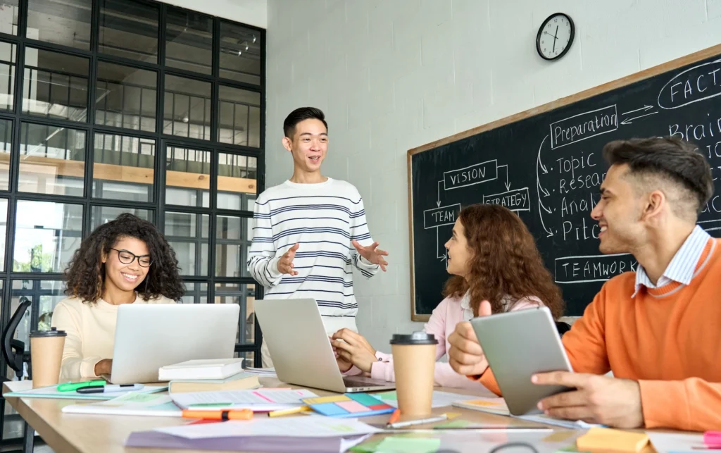 young people work in a conference room