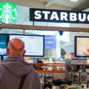 people standing in line at Starbucks