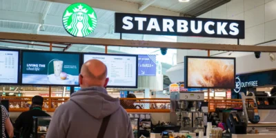 people standing in line at Starbucks