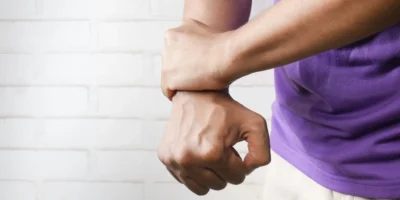 man holding his wrist