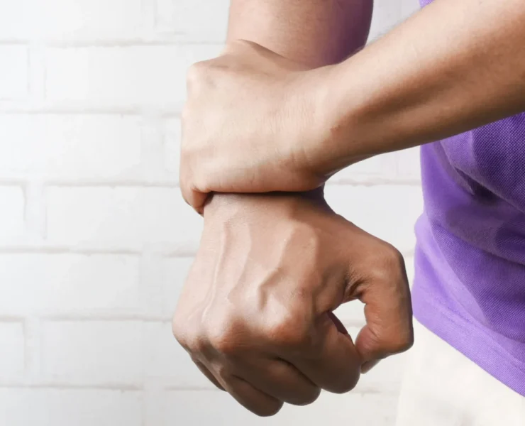 man holding his wrist