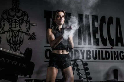 Anne Marie Chaker working out in a bodybuilding gym