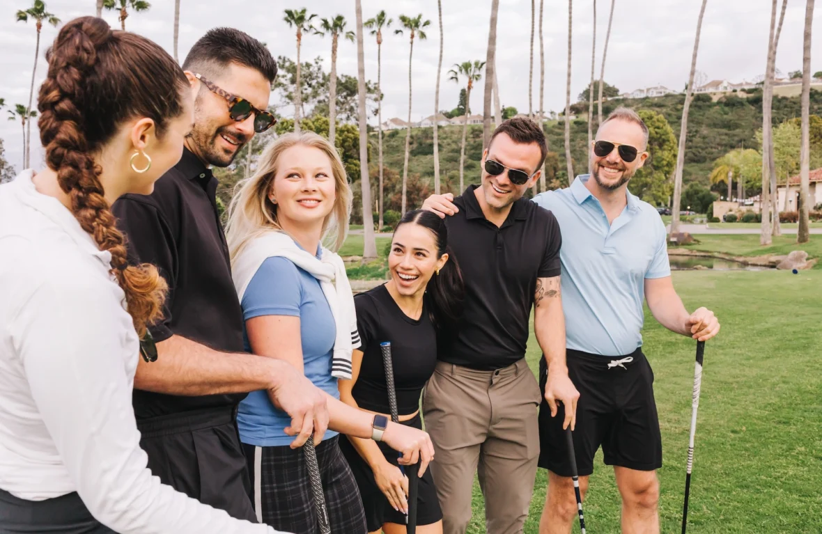 people golf together at a Bay Club course