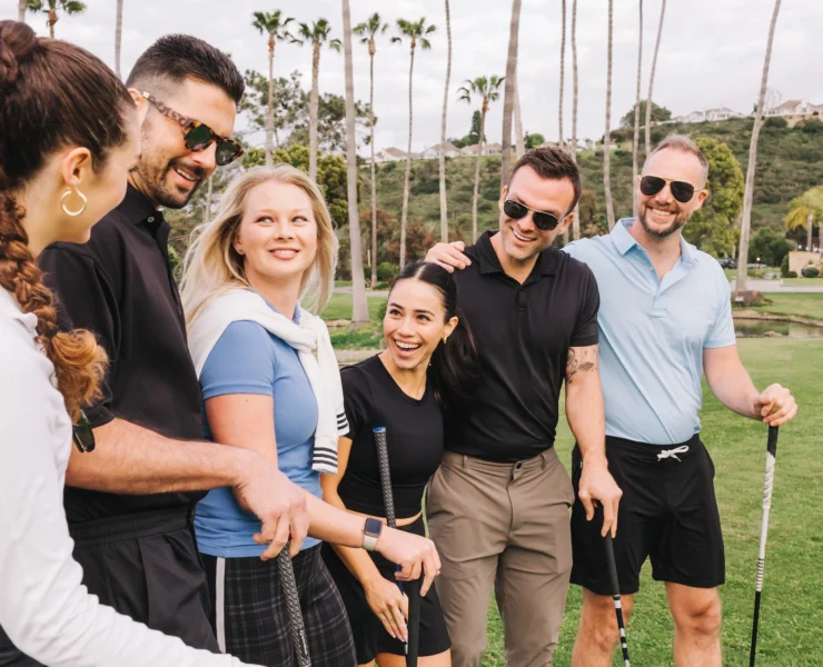 people golf together at a Bay Club course