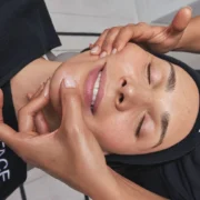 A woman receiving a treatment from FaceGym