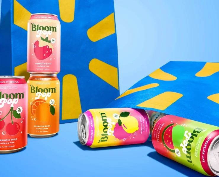 Bloom soda cans displayed next to Walmart bags