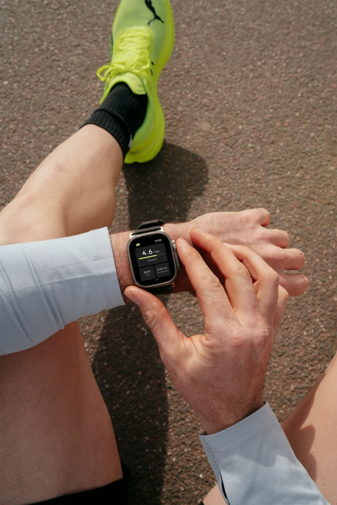 A person looking at their smartwatch.