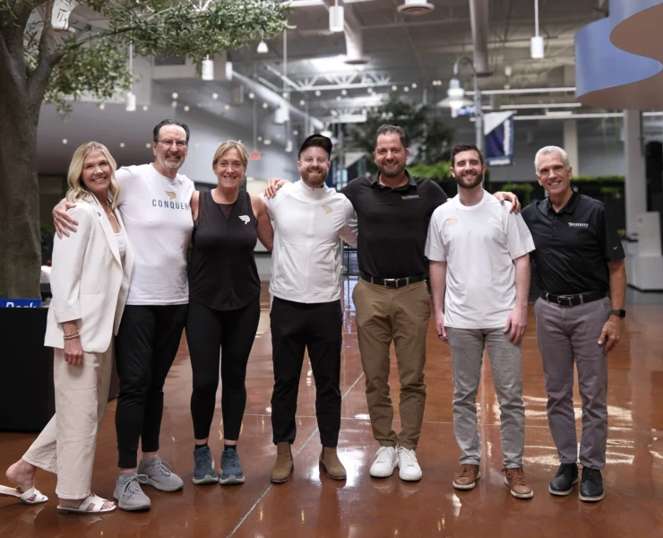 Alex and Greg Baker with the Conquer Padel team at their Tempe, AZ offices.
