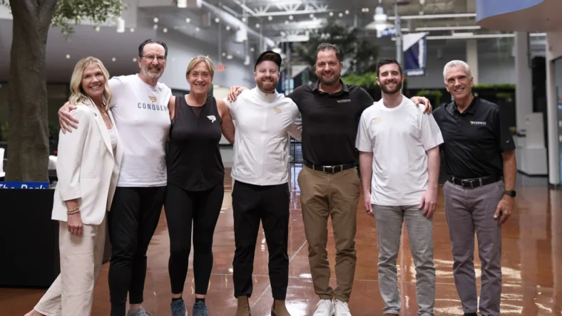 Alex and Greg Baker with the Conquer Padel team at their Tempe, AZ offices.
