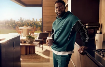 Kevin Hart in kitchen wearing Fabletics gear
