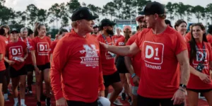 D1 Training CEO Will Bartholomew with Jon Gruden, former NFL head coach, former Monday Night Football broadcaster, and current Barstool Sports personality