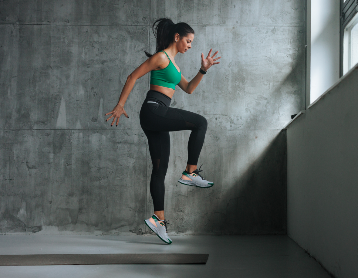 Woman jumping at the gym