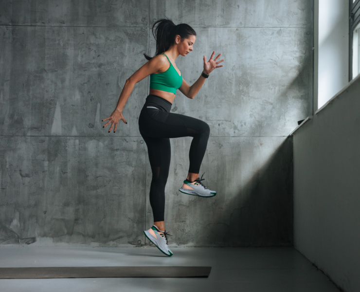 Woman jumping at the gym